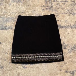 Black jeweled Jessica Simpson skirt with elastic waistband. Size small.